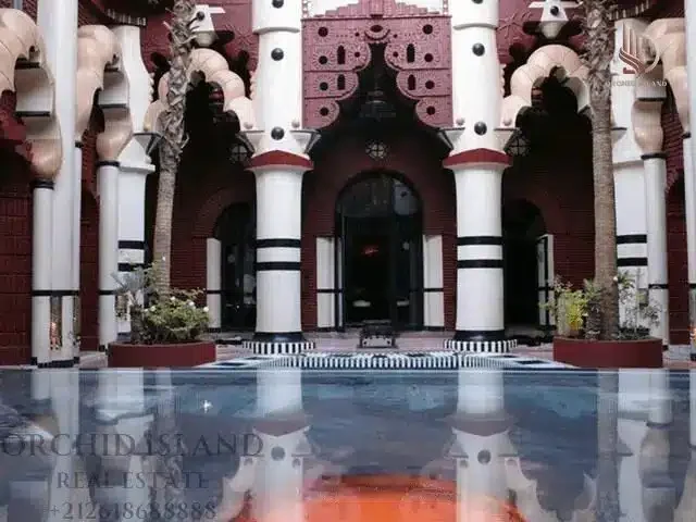 Historic palace riad in Marrakech with a grand courtyard