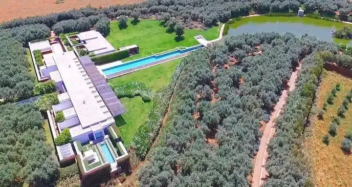 Private Marrakech estate with mirror pool, lake and Atlas Mountain views